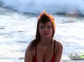 Hot babes on the beach teasing the camera