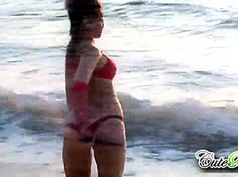 Hot babes on the beach teasing the camera
