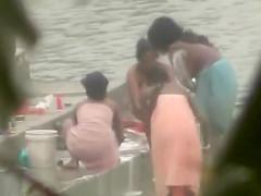 Indian wives wash their breasts