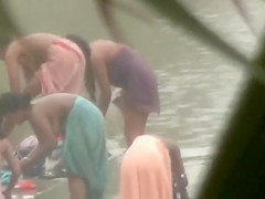 Indian wives wash their breasts