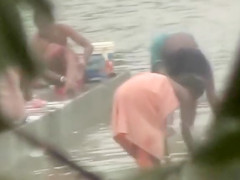 Indian wives wash their breasts