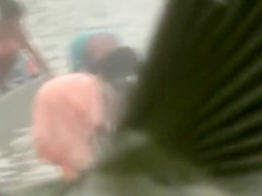 Indian wives wash their breasts