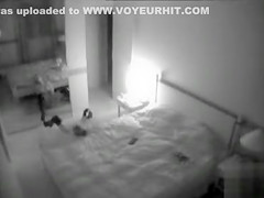 Leggy lady in boots masturbates across from the mirror