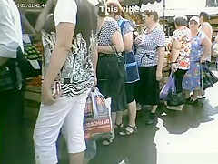 Long dress upskirt in street market