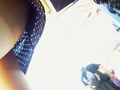 Lovely brunette spied on by an upskirt
