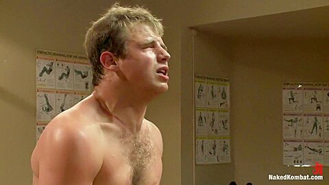 Muscled hunks duke it out in the gym, loser takes it in the ass!