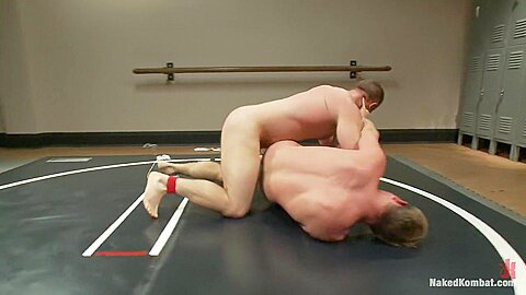 Muscled hunks duke it out in the gym, loser takes it in the ass!