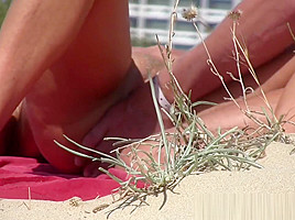 Nudist Milf Finger fucked at the beach