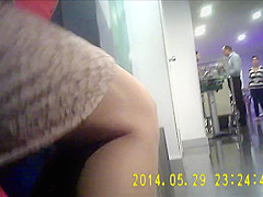 Office woman in very shiny tan pantyhose