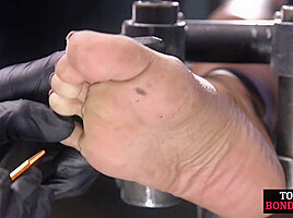 Poor BDSM Ebony babe feet whipped by rough CMNF master