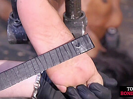 Poor BDSM Ebony babe feet whipped by rough CMNF master