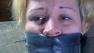 Restrained fem slave caned as punisment