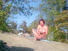Russian nudist woman gets spied on at the beach