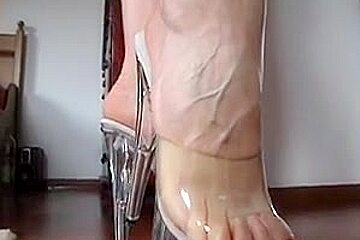 Sexually Excited blonde's shoejob with her transparent platform heels