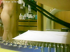 She gets spied putting on panties