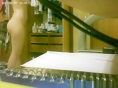 She gets spied putting on panties