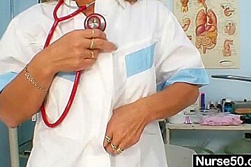 Skinny milf senior nurse toys her pussy on gynochair