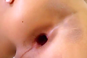 Slender Asian shemale with fake boobs shows off her asshole