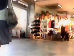 Spying under a serious woman's skirt
