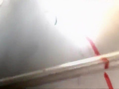 Spying under a serious woman's skirt