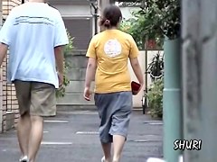 Street sharking with woman in jeans shorts