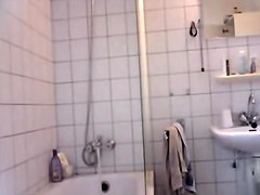 Tan lined ass and hairy cunt of hidden shower cam bimbo