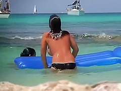 Topless teens 18+ having fun in the water