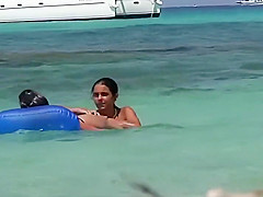 Topless teens 18+ having fun in the water
