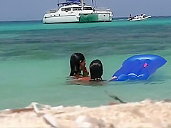 Topless teens 18+ having fun in the water
