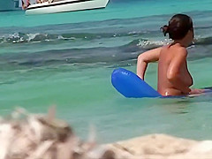 Topless teens 18+ having fun in the water