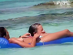 Topless teens 18+ having fun in the water