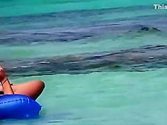 Topless teens 18+ having fun in the water