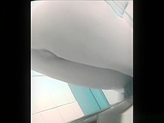 Two women in blue skirts spied pissing