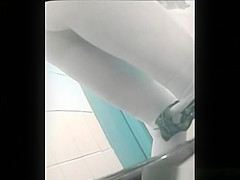 Two women in blue skirts spied pissing