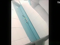 Two women in blue skirts spied pissing