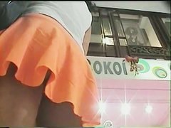 Upskirts video of a cute girl in an orange skirt