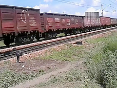 Walking naked by railroad