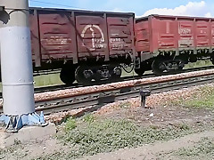 Walking naked by railroad