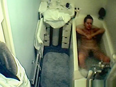 Wife spied in bathtub relaxing