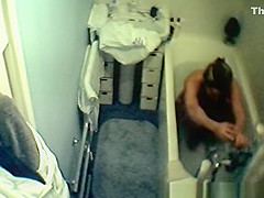 Wife spied in bathtub relaxing