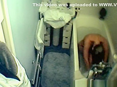 Wife spied in bathtub relaxing