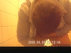 Woman with short hair pissing