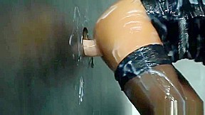 hot blonde sucks a cock through a gloryhole