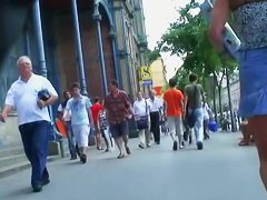 porno vid of a brunette babe in a jean skirt walking around