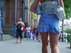 porno vid of a brunette babe in a jean skirt walking around